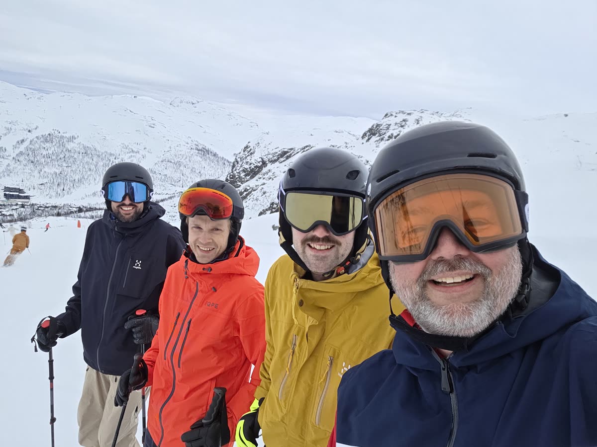 The crew at the summit, goggles on
